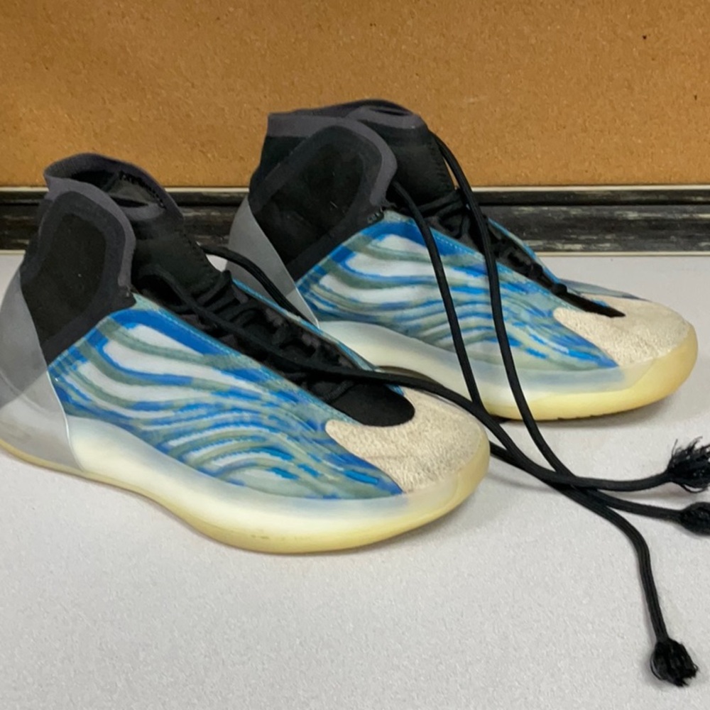 Adidas Yeezy QNTM Frozen blue sneakers featuring a wave-like blue cage